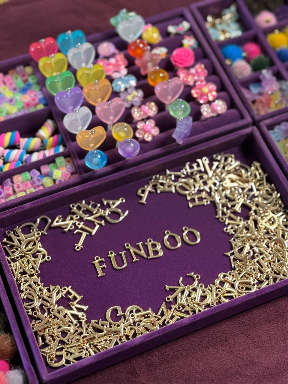 Charm Bar Experience — girls designing jewellery at party